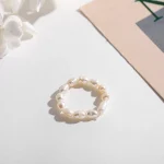 accessoire chic perle blanche