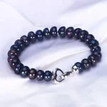 bracelet perle d'eau douce semi-ronde noire
