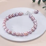 perles d'eau douce violettes sur chaîne argent