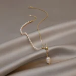 collier perle et chaîne dorée