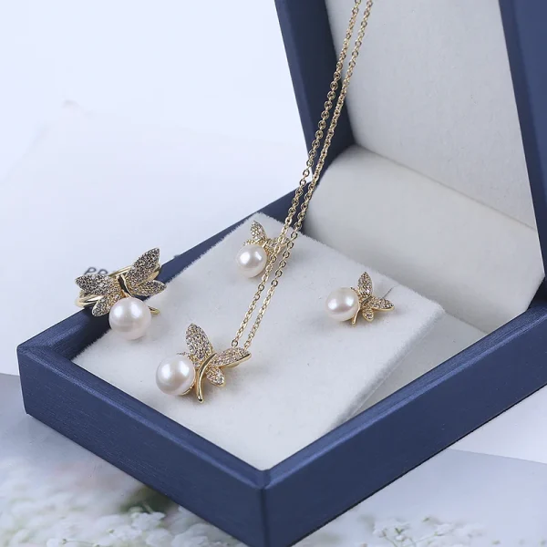 Parure perle d'eau douce bouton blanc feuilles