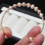 Élégant bracelet perle dorée
