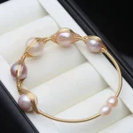 bracelet perle d'eau douce couleur or