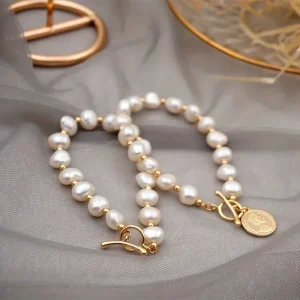 bracelet perle d'eau douce blanche 7-8 mm couleur or