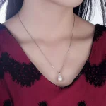 collier ras de cou perle d'eau douce blanche