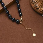 bijou perle noire en forme de riz