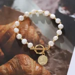 bracelet précieux perle blanche et or
