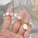 perles d'eau douce bracelet couleur or