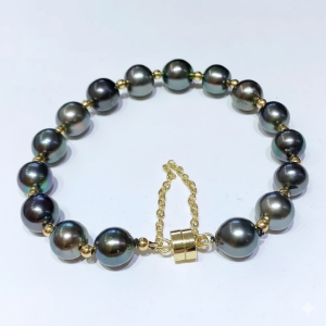Superbe bracelet en perles noires de Tahiti de 10-11 mm, chaîne couleur or