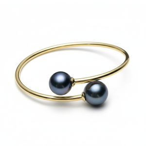 Magnifique bracelet avec perles noires rondes naturelles de Tahiti de 10-11 mm, couleur or