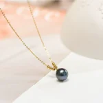 collier or et perle noire de Tahiti