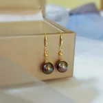 Boucles d'oreilles en or avec perles de culture noires
