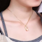 pendentif cygne perle 9 à 10 mm