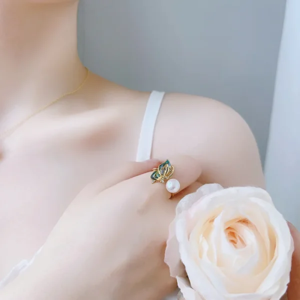 parure perle de culture papillon doré