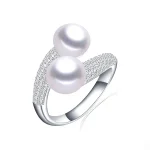 bague scintillante double perle de culture blanche